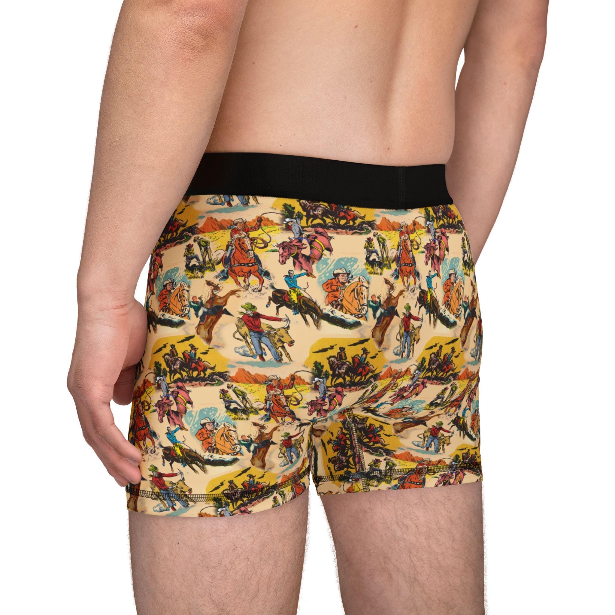 Ropin’, ridin’, and loungin’ in style 🤠 These retro cowboy boxers are here to wrangle your underwear drawer with bold vintage vibes! Featuring an allover cowboy print on a cheerful yellow background, these are a must-have for any guy with a wild side—or anyone who loves a good gift with personality.

✓ Allover retro cowboy print – yeehaw in every inch
✓ Comfy elastic waistband for an easy fit

✓ Makes a hilarious and stylish gift for birthdays, holidays, or just because