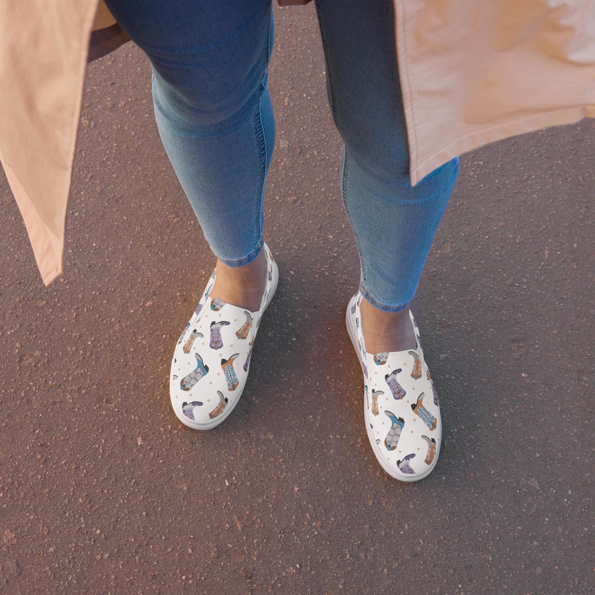 Cowboy Boot Print Women’s Slip-On Shoes | Western Canvas Comfort 
Step out in bold, boot-scootin’ style! These Western slip-on shoes feature a playful all-over cowboy boot print in shades of grey, purple, and turquoise—perfect for adding a pop of personality to any outfit.
Lightweight and breathable with soft insoles and a durable rubber outsole, these comfy kicks are made for rodeo weekends, country concerts,
✓ Colorful cowboy boot print in grey, purple & turquoise. FREE SHIPPING