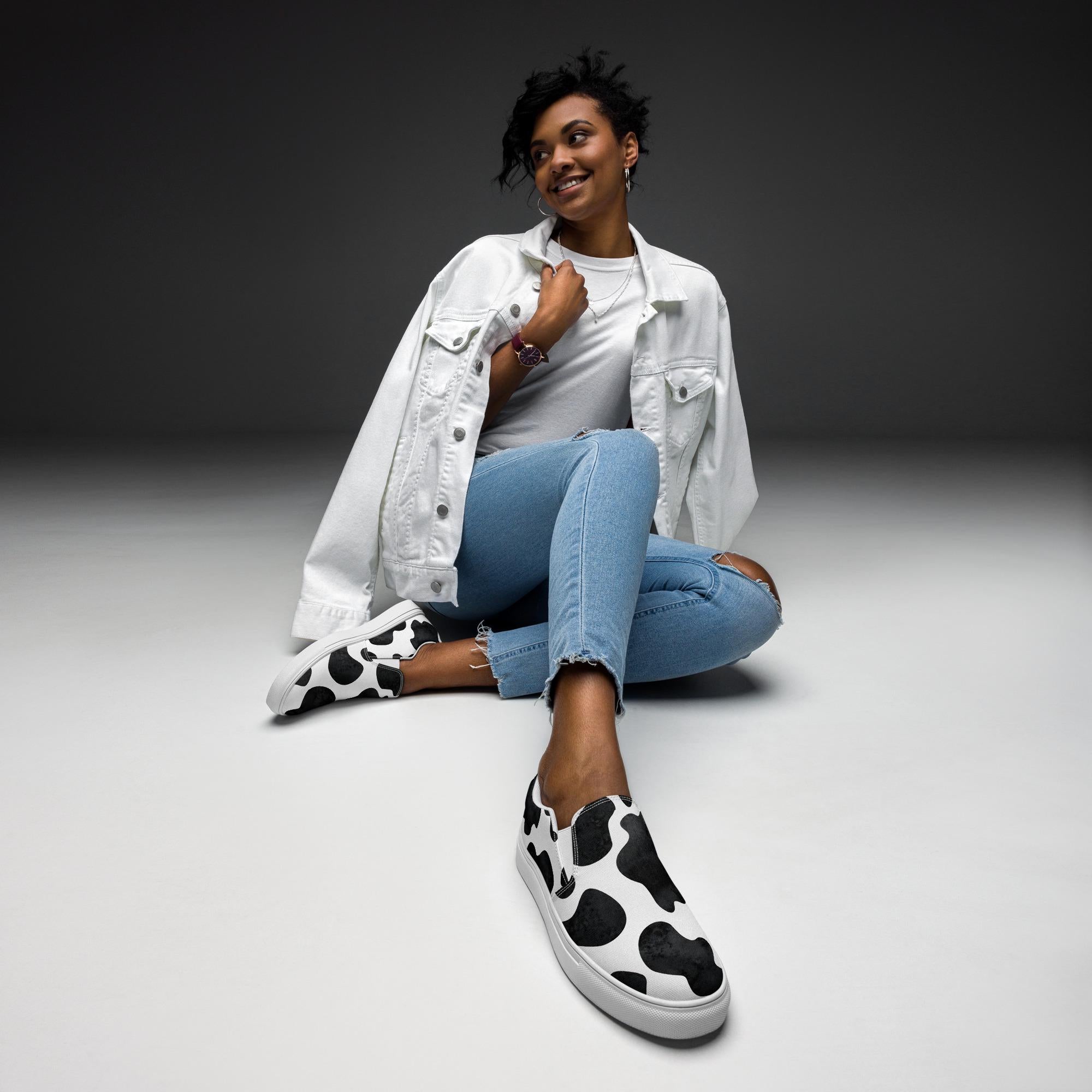 Cowprint Women’s Slip-On Shoes | Black & White Western Canvas Kicks  These black and white slip-on canvas shoes are the perfect blend of bold Western vibes and all-day comfort. Whether you&#39;re pairing them with denim cutoffs or your favorite dress, they&#39;re ready to moooove with you. ✓ Elastic side accents for easy on/off
✓ Breathable lining + soft removable insole
✓ Padded collar and tongue for added comfort
✓ Razels branding on the box, tongue & insole
✓ Printed, cut & handmade with care