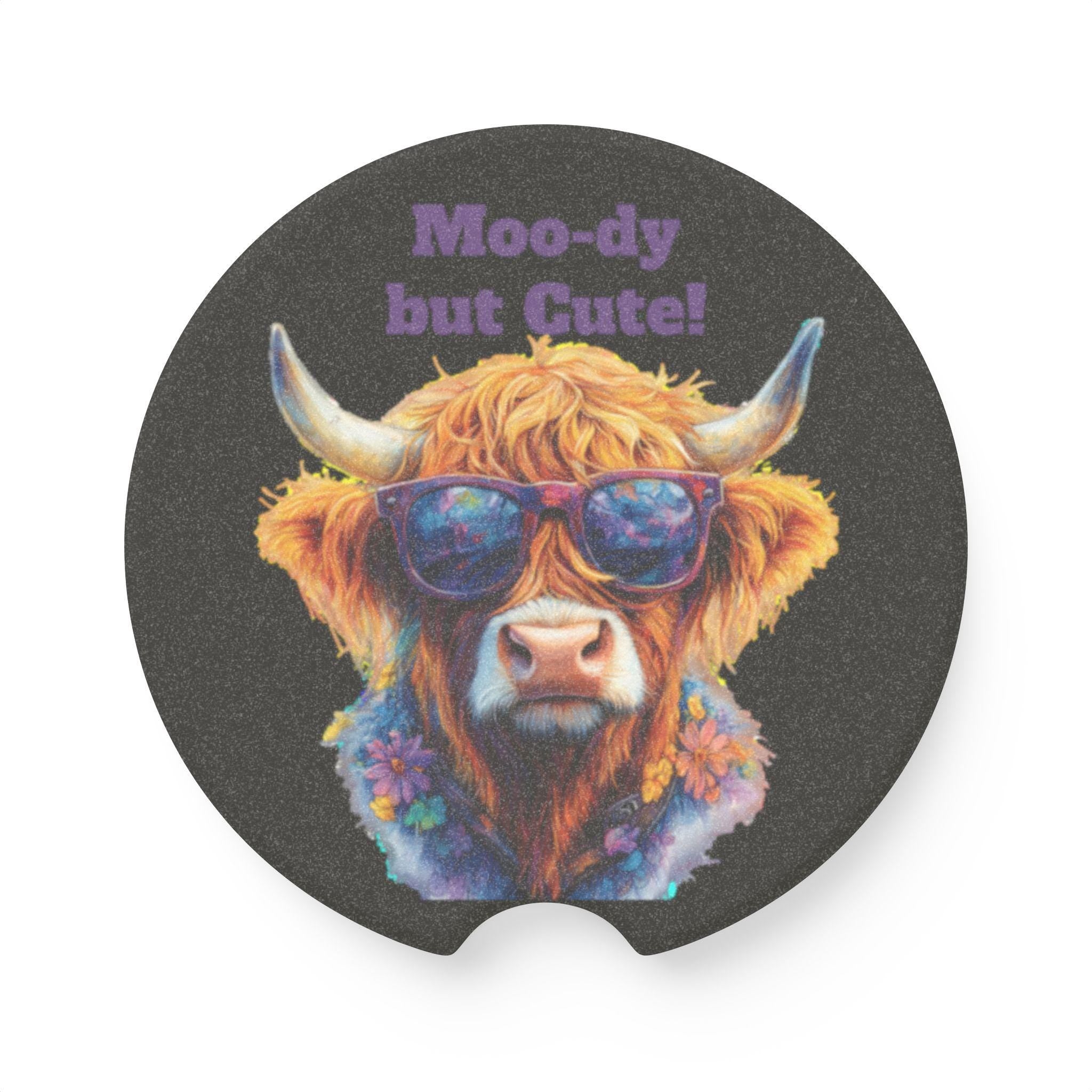 Moo-dy but Cute!&quot; Highland Cow Car Coaster | Sassy Cowgirl Cup Holder Decor Bring the sass to your dash with this bold and adorable Highland cow car coaster! Featuring a flower-crowned cow in sunglasses and the cheeky quote &quot;Moo-dy but Cute!&quot;, this coaster adds a whole lotta personality to your ride. Want to switch it up? Personalize it with your own short saying, name, or business

✓ Absorbs condensation to keep cup holders clean
✓ Sassy Highland cow design with a flower necklace