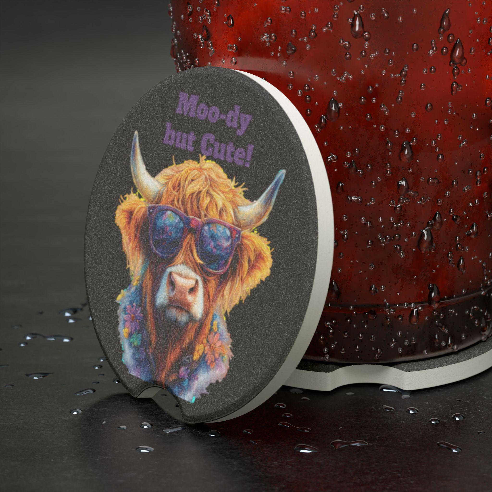 Moo-dy but Cute!&quot; Highland Cow Car Coaster | Sassy Cowgirl Cup Holder Decor Bring the sass to your dash with this bold and adorable Highland cow car coaster! Featuring a flower-crowned cow in sunglasses and the cheeky quote &quot;Moo-dy but Cute!&quot;, this coaster adds a whole lotta personality to your ride. Want to switch it up? Personalize it with your own short saying, name, or business

✓ Absorbs condensation to keep cup holders clean
✓ Sassy Highland cow design with a flower necklace