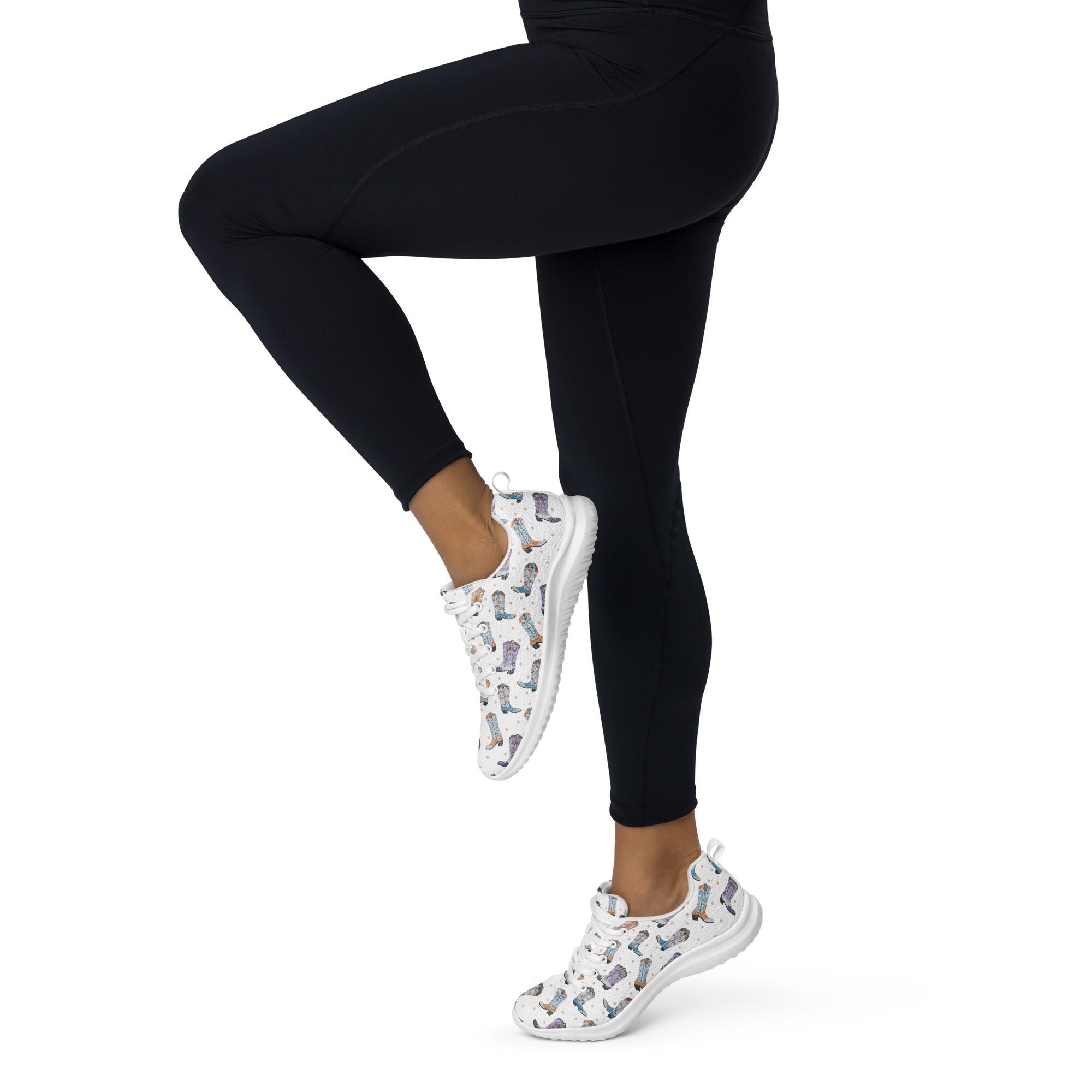 Cowboy Boot Athletic Sneakers | Lightweight Western Lace-Up Shoes 
Put a little giddy-up in your step! These lightweight athletic sneakers are covered in a fun and funky cowboy boot print in grey, purple, and turquoise—bringing Western charm to your everyday hustle. Whether you&#39;re on your feet all day or running errands around town, 
✓ All-over cowboy boot print in grey, purple & turquoise
✓ Lace-up front for a secure fit
✓ Matching colored soles & laces
FREE SHIPPING