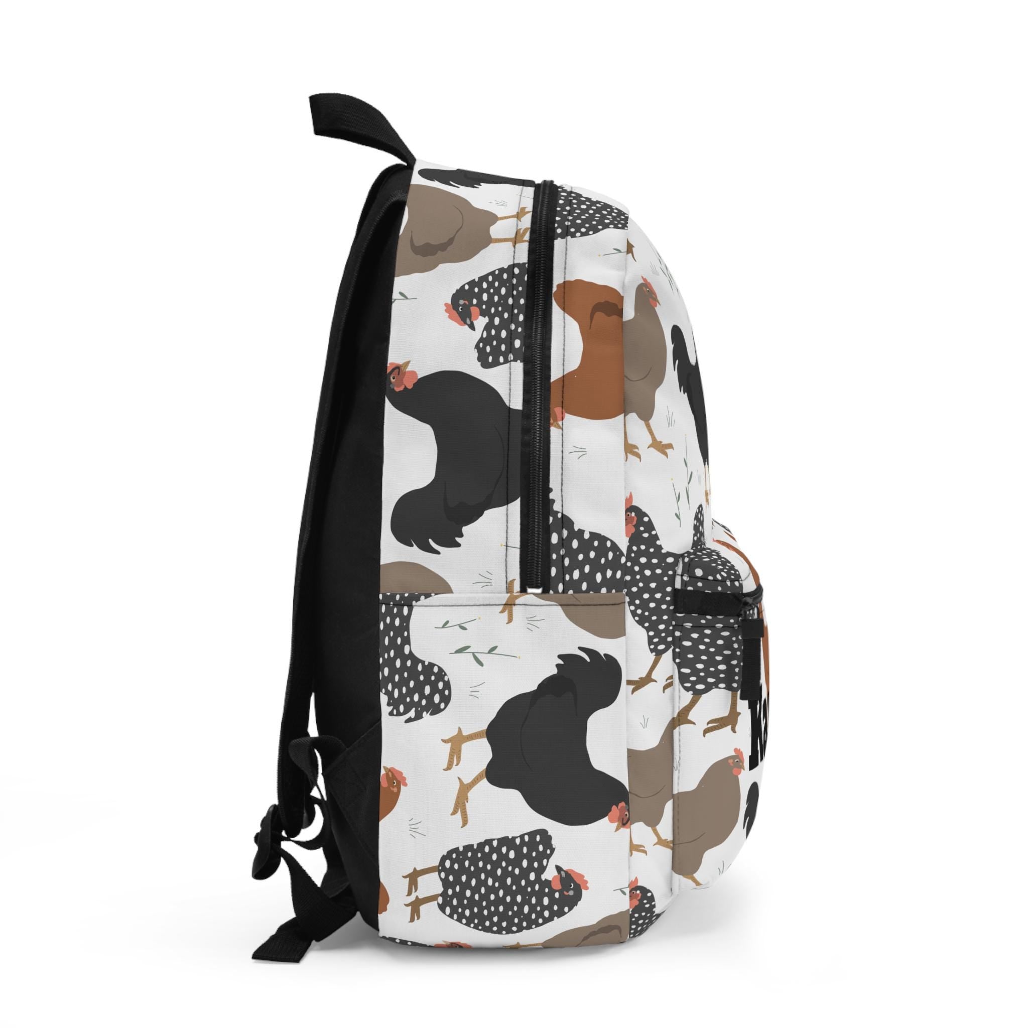 Custom Chicken Backpack – Personalized Name, Farm Hen Print, 17&quot; School Bag w/ Laptop Sleeve

Cluck yeah! This roomy, durable backpack brings farm-fresh style to school days and errands. Add your name or initials for a custom finish kids (and chicken-loving grownups) adore.

✓ Personalization: add a name/initials (printed exactly as typed)
✓ 4 compartments: main zip (13L), front zip, side bottle pocket, interior laptop/tablet sleeve
✓ One size: 17&quot; H × 12.5&quot; W × 5&quot; D (±0.5&qu