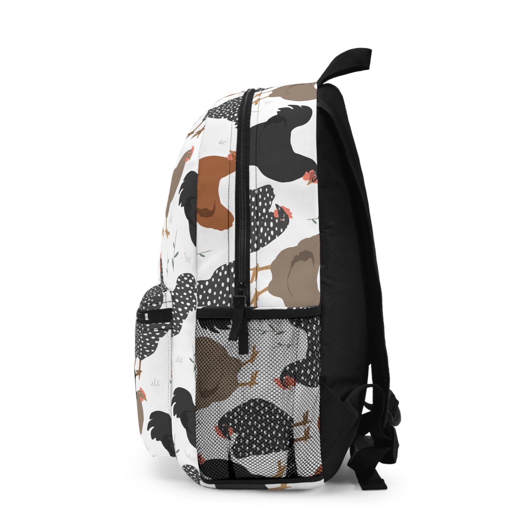 Custom Chicken Backpack – Personalized Name, Farm Hen Print, 17&quot; School Bag w/ Laptop Sleeve

Cluck yeah! This roomy, durable backpack brings farm-fresh style to school days and errands. Add your name or initials for a custom finish kids (and chicken-loving grownups) adore.

✓ Personalization: add a name/initials (printed exactly as typed)
✓ 4 compartments: main zip (13L), front zip, side bottle pocket, interior laptop/tablet sleeve
✓ One size: 17&quot; H × 12.5&quot; W × 5&quot; D (±0.5&qu