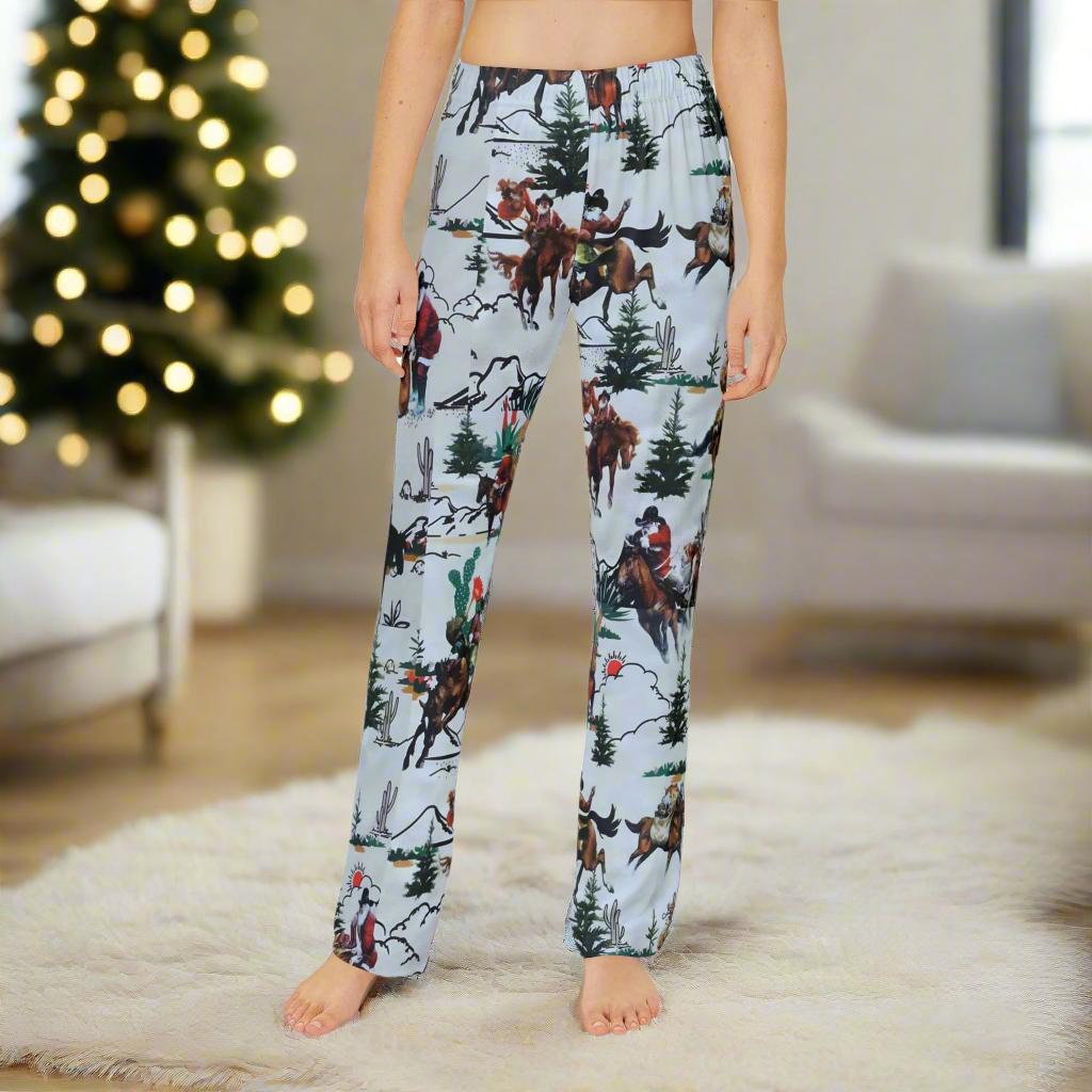 Cowboy Santa Kids Lounge Pants | Matching Family Christmas Pajamas | Soft & Comfy Kids Sleepwear

Yeehaw! 🎄 These Cowboy Santa Kids Lounge Pants are ready to giddy-up into your holiday season! Featuring our exclusive all-over Cowboy Santa print—complete with jolly ol’ Saint Nick delivering gifts on horseback (with one horse looking a little broncy!)—these pants are a festive favorite for wild little cowpokes.