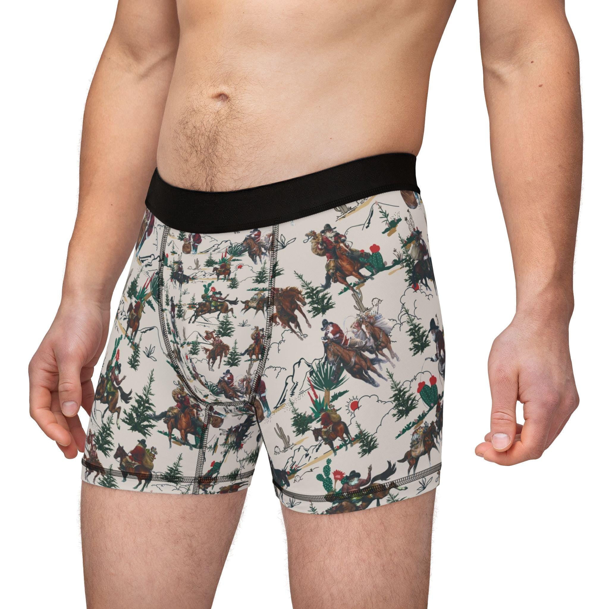 Saddle up for some serious holiday cheer! These Men’s Cowboy Santa Boxers are bringing the Christmas spirit with a bold Western twist. Featuring Cowboy Santa riding horseback (with a wild bronc or two in the mix), these festive undies are perfect for Christmas morning laughs, cozy nights in, or just spicing up your everyday basics. 
✓ 92% polyester for durability and fast drying
✓ Soft elastic waistband for all-day comfort
✓ Bright, vibrant allover Cowboy Santa print
FREE SHIPPING $35+