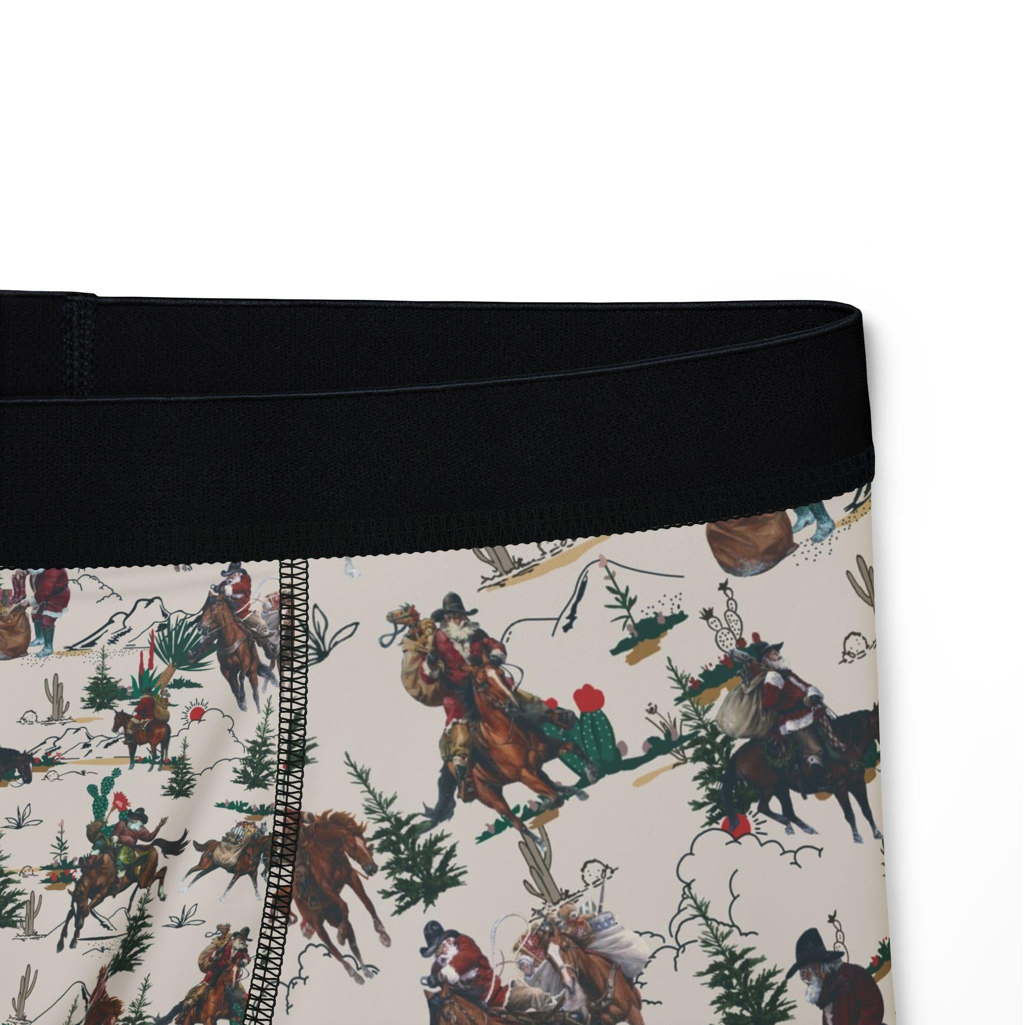 Saddle up for some serious holiday cheer! These Men’s Cowboy Santa Boxers are bringing the Christmas spirit with a bold Western twist. Featuring Cowboy Santa riding horseback (with a wild bronc or two in the mix), these festive undies are perfect for Christmas morning laughs, cozy nights in, or just spicing up your everyday basics. 
✓ 92% polyester for durability and fast drying
✓ Soft elastic waistband for all-day comfort
✓ Bright, vibrant allover Cowboy Santa print
FREE SHIPPING $35+