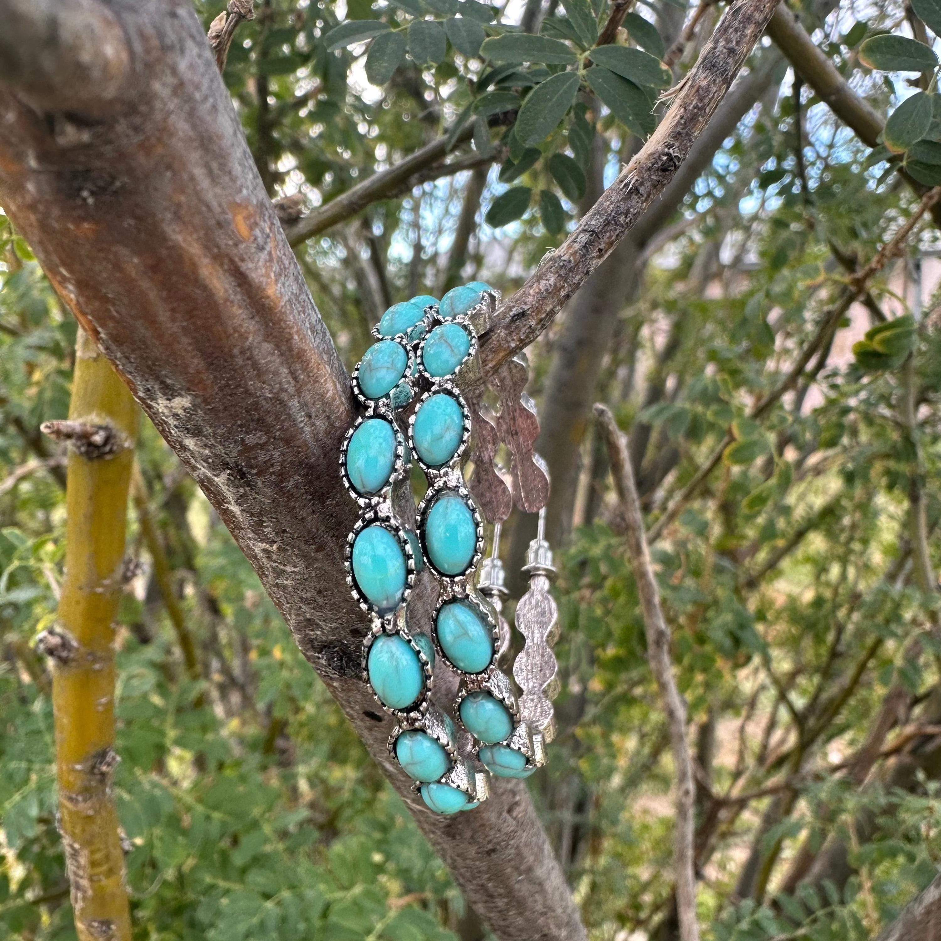 Western Turquoise Hoop Earrings ✨Western Earrings for Women
Featuring a bold C-shape design, a burnished silver finish, and vibrant gemstone inlay, they blend rustic elegance with boho-chic vibes. Large hoop earrings 1.8" diameter. Ship FREE w/ $35+