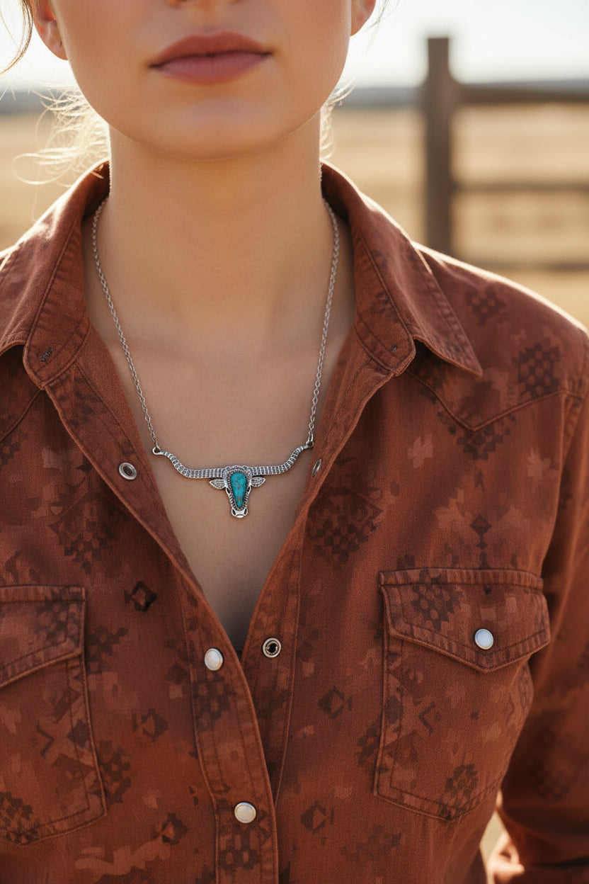 Bold and Beautiful: Split Chain Longhorn Necklace with Turquoise Stone. Embrace a bold, Western style with our stunning Split Chain Longhorn Necklace—designed for those who truly & grab life by the horns. Ships FREE with $35+ purchase