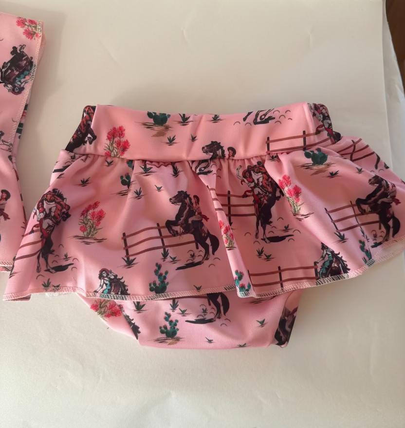 pink retro cowgirl tankini skirted bottom on white background