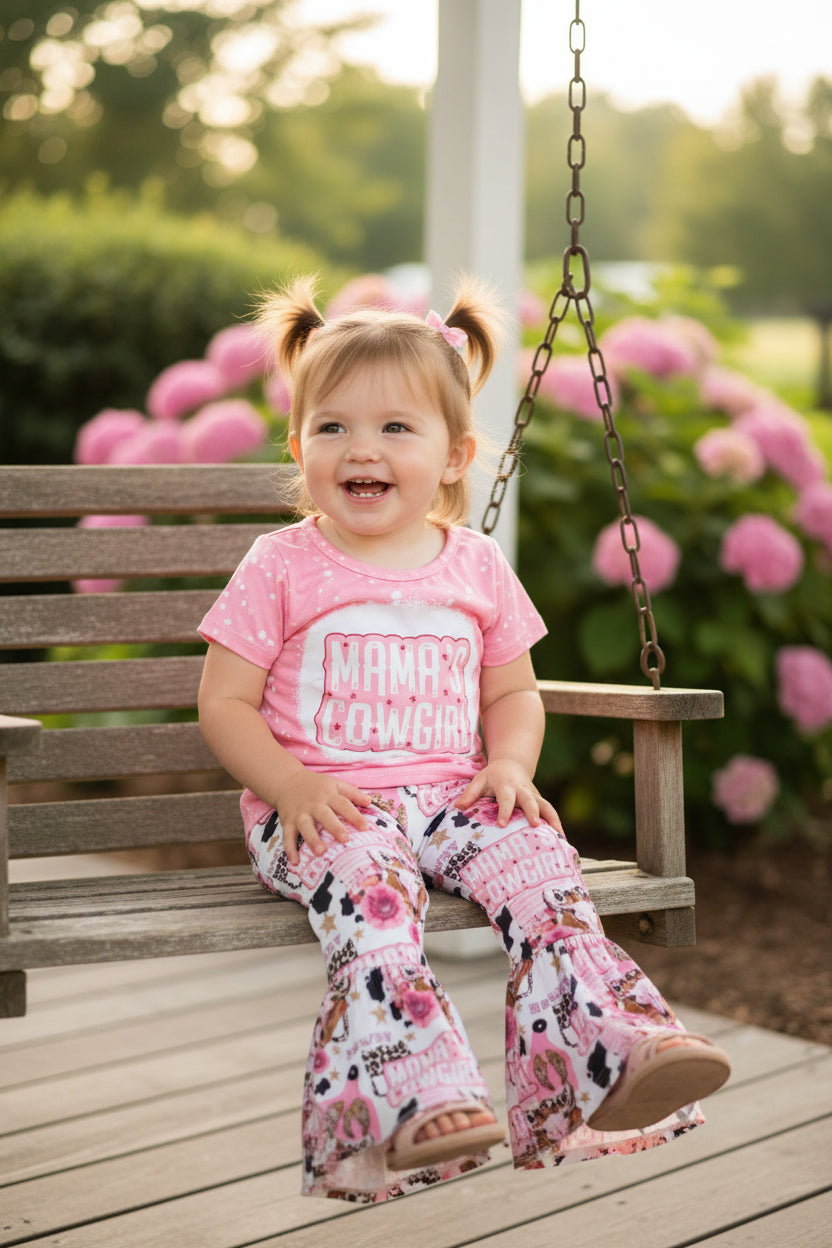 toddler girl sitting on swimg wearing Razels Mama’s Cowgirl Bell Bottom Outfit 