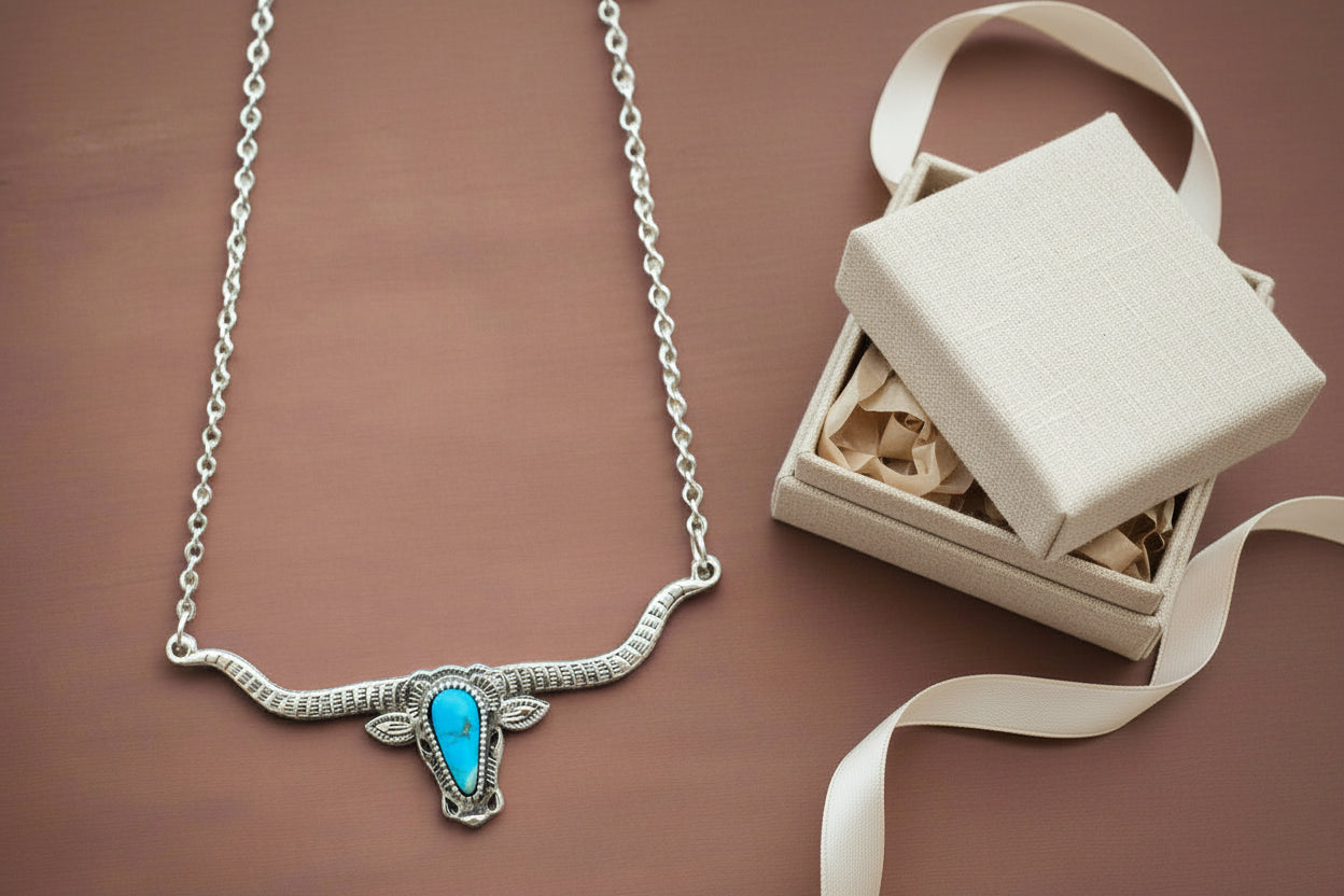 Bold and Beautiful: Split Chain Longhorn Necklace with Turquoise Stone. Embrace a bold, Western style with our stunning Split Chain Longhorn Necklace—designed for those who truly & grab life by the horns. Ships FREE with $35+ purchase