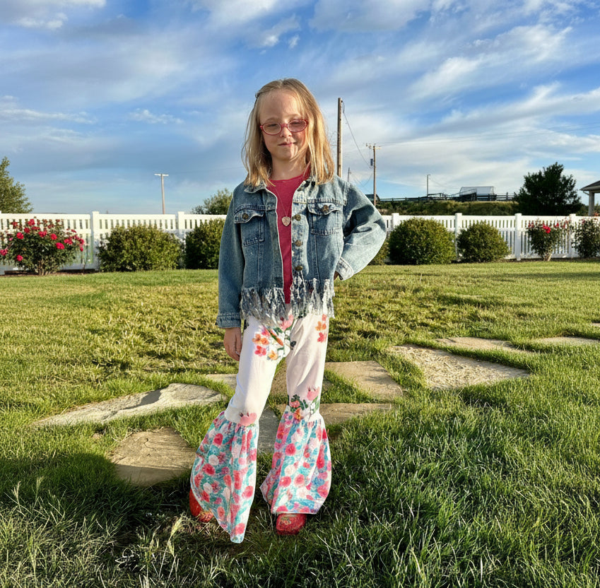 Floral Bell Bottoms designed with vibrant flower patterns and fun, playful colors are made with high-quality materials that promise comfort and durability, ensuring they’ll be a favorite all season long. These Wildflower pants will not disappoint!