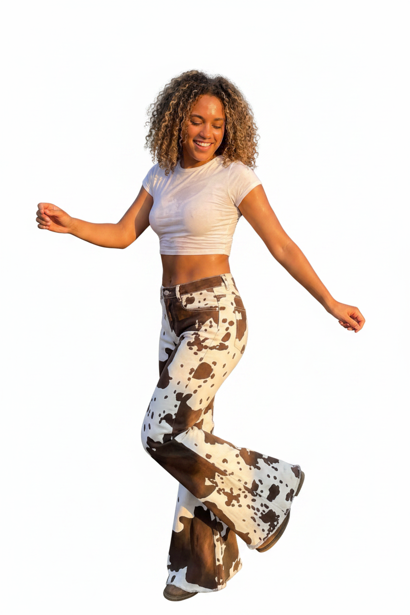 womens_cowprint_bell_bottom_high_rise_jeans against white background