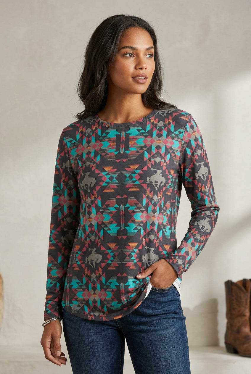 woman wearing womens western bronc tunic in room with boots in background